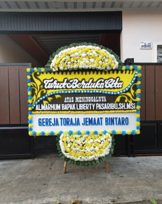 Papan Bunga Duka di Tamako